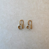 Pair of 18ct gold Hayes drop earrings featuring delicate round brilliant lab-grown diamonds cascading in a round silhouette, set against a white backdrop.