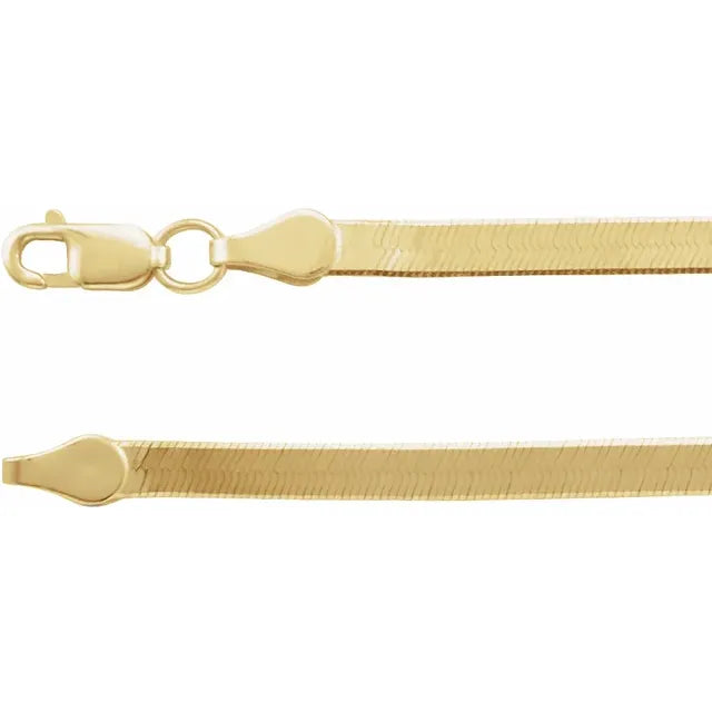 Mini herringbone necklace in 14 ct gold, 2.8 mm wide and 40 cm long, close up