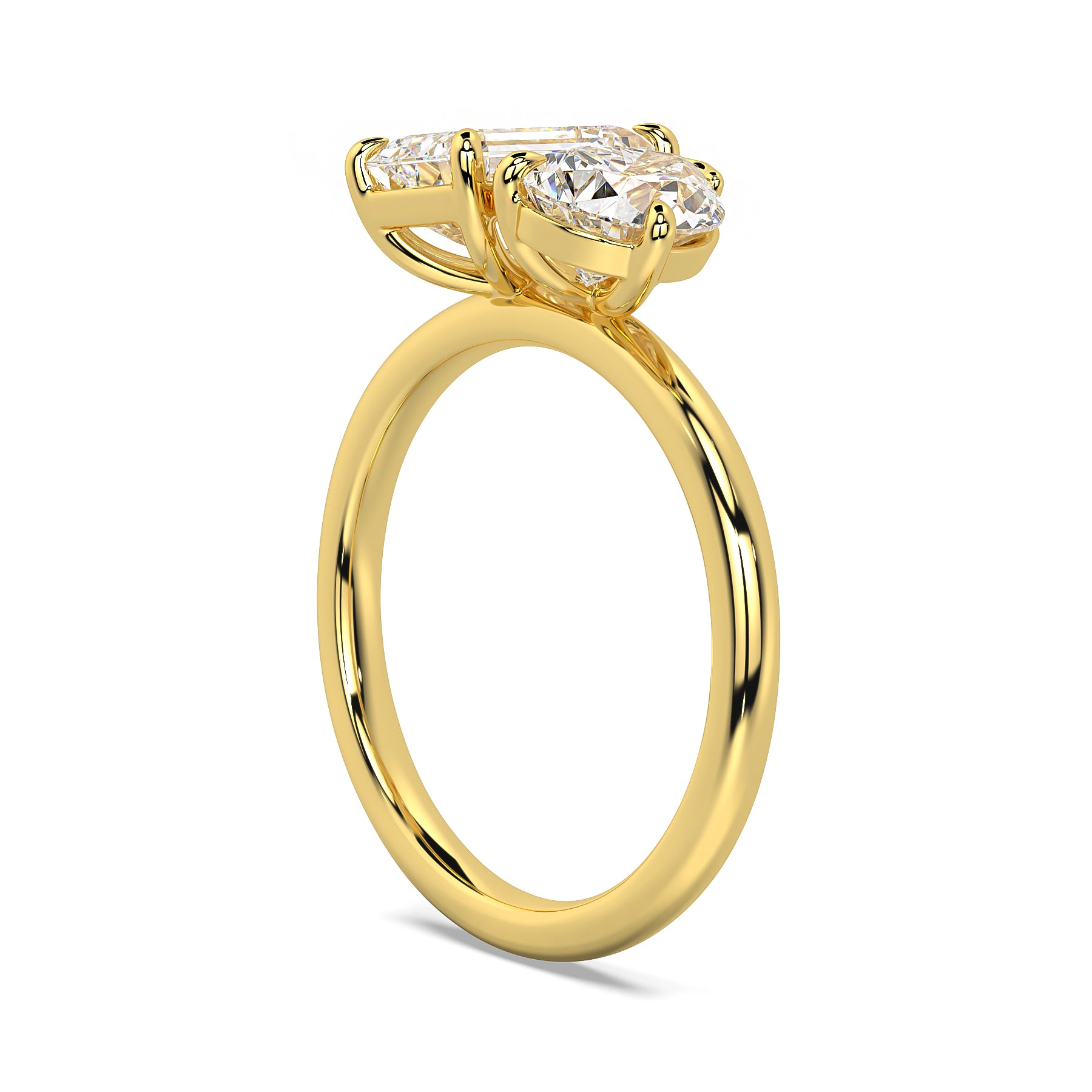 MOHSTEN JEWELLERS . CAIRO toi et moi diamond engagement ring - pear cut and emerald cut - yellow gold - - side angle view
