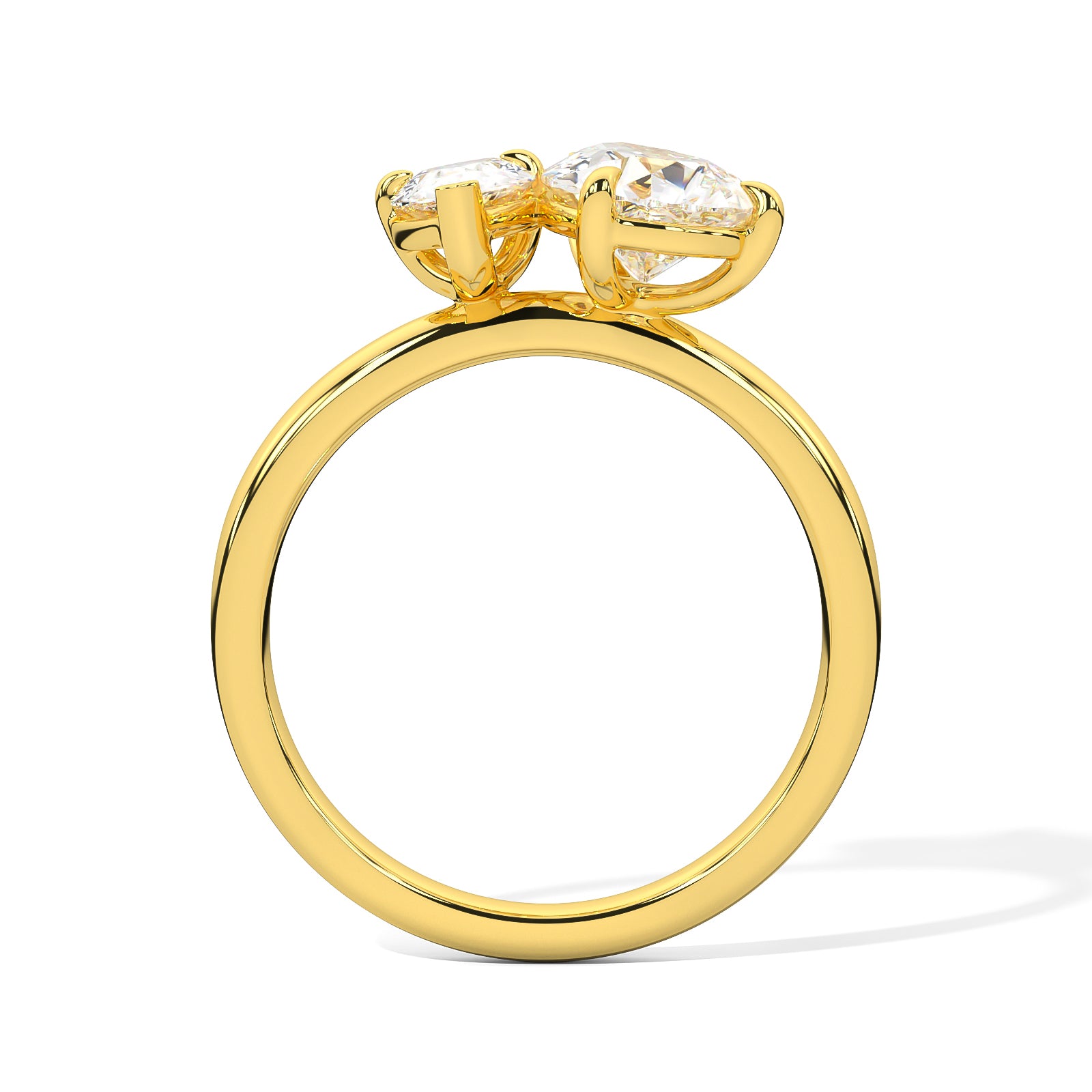 MOHSTEN JEWELLERS . CAIRO toi et moi diamond engagement ring - pear cut and pear cut - yellow gold - through finger view