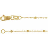 Clasp and polished finish detail of Beaded Cable Bracelet in 14ct gold