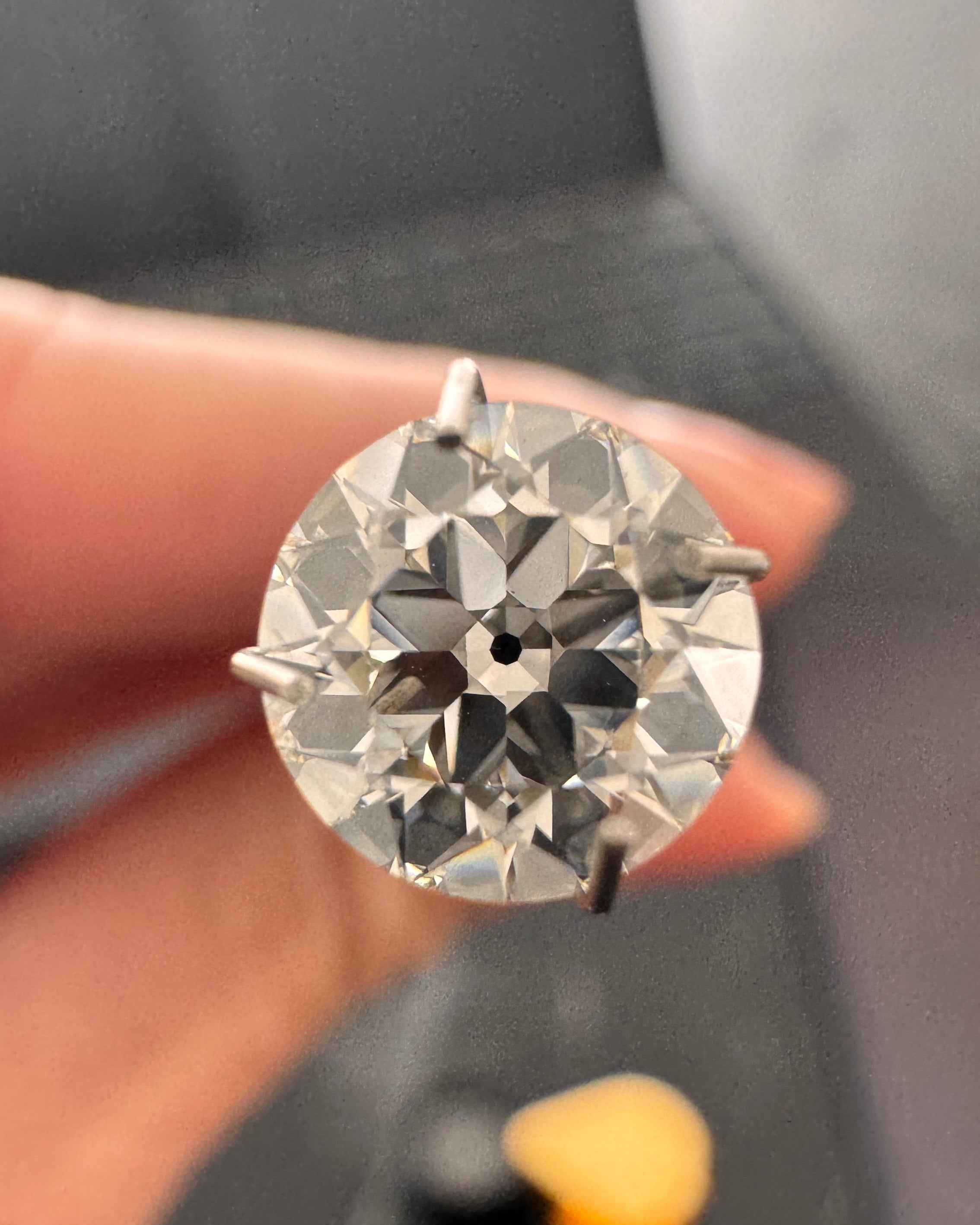 Close-up of a 1.52ct Old European cut lab-grown diamond held in prongs, showing its vintage chunky facets and optical brilliance. Sourced for MOHSTEN bespoke custom engagement rings in Auckland, New Zealand.