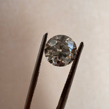 1.52ct Old European cut lab diamond held in stone holder, showcasing vintage facets for MOHSTEN custom rings in Auckland, NZ.