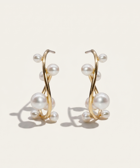 MOHSTEN Bride Gold hoop earrings with pearls on a beige background