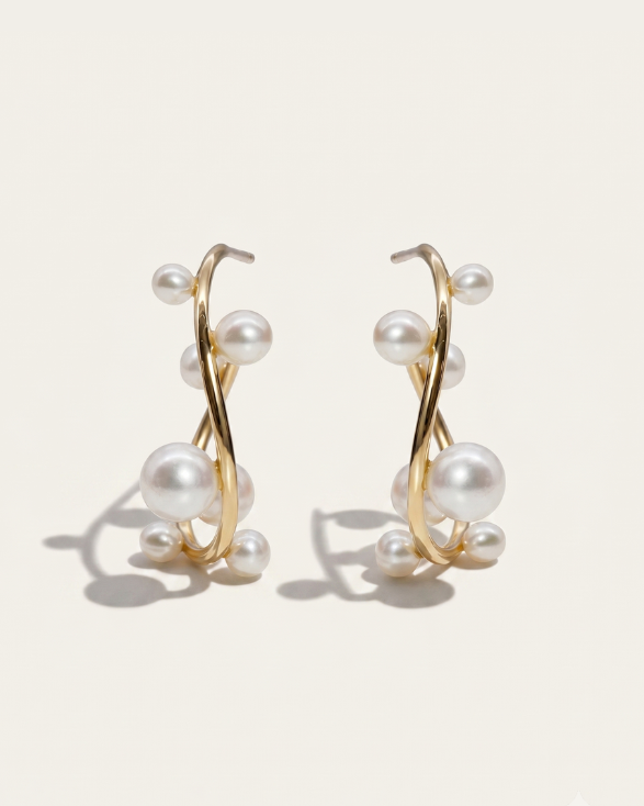 MOHSTEN Bride Gold hoop earrings with pearls on a beige background