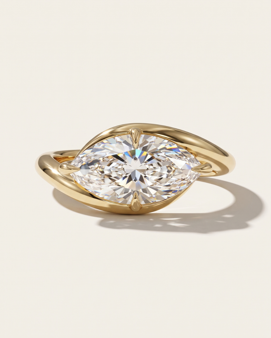 A yellow gold engagement ring concept featuring a 2.01ct marquise cut lab diamond set east-west. A bespoke custom design by MOHSTEN jewellery studio in Auckland, New Zealand.