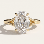 lose-up of a yellow gold engagement ring concept showcasing a 2.09 carat oval step cut lab-grown diamond with a unique split-shank architectural setting. Available for custom commissions at MOHSTEN in Auckland, NZ.