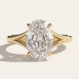 lose-up of a yellow gold engagement ring concept showcasing a 2.09 carat oval step cut lab-grown diamond with a unique split-shank architectural setting. Available for custom commissions at MOHSTEN in Auckland, NZ.