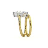 Gold ring with a diamond on a white background