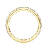 Close-up of Amaya Diamond Band showing 33 round diamonds in shared-claw setting