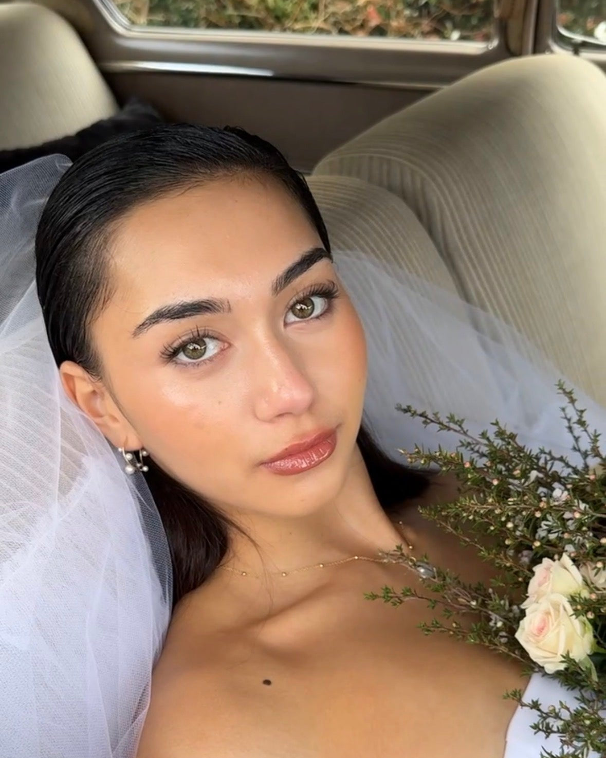 MOHSTEN bride wearing freshwater pearl earrings and a 9ct gold chain