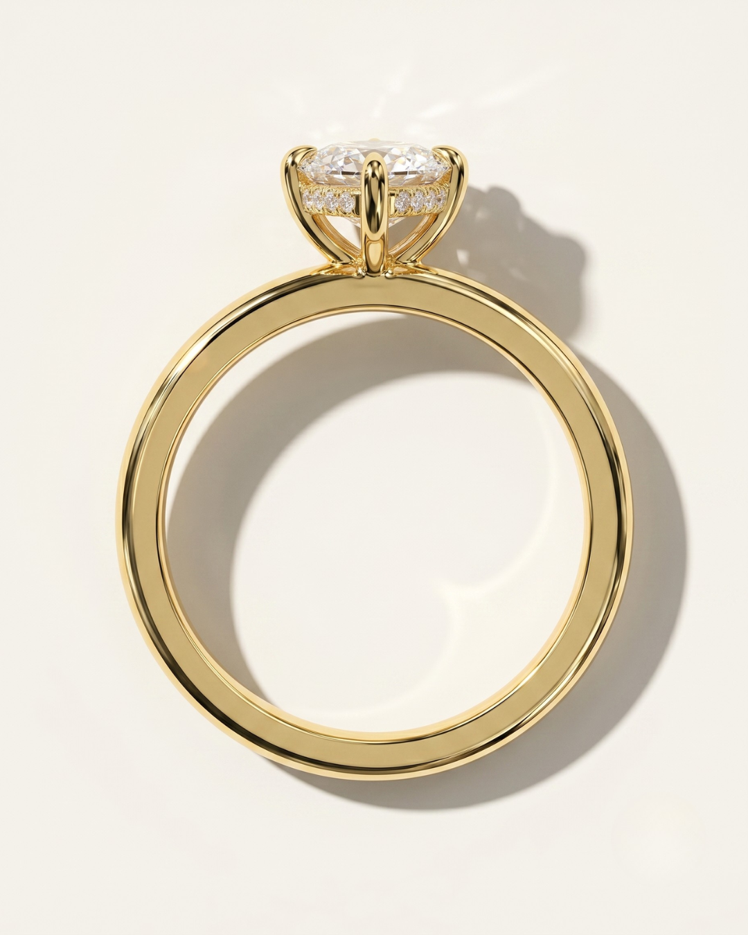 CAD Gold ring with a diamond on a light beige background. MOHSTEN CAD process guide