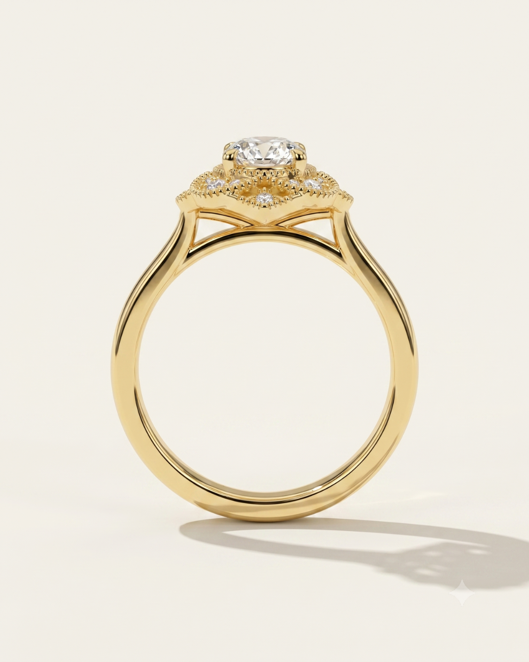 MOHSTEN The Capri vintage scalloped milgrain halo oval engagement ring profile in 18ct yellow gold.