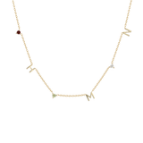 Gold necklace with letter pendants on a white background