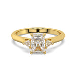 MOHSTEN JEWELLERS - Monaco -  radiant cut diamond cathedral trilogy trillion side stone engagement ring, yellow gold,  top view