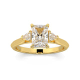 MOHSTEN JEWELLERS - Monaco -  radiant cut diamond cathedral trilogy trillion side stone engagement ring, yellow gold, top view 1