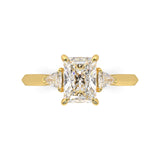 MOHSTEN JEWELLERS - Monaco -  radiant cut diamond cathedral trilogy trillion side stone engagement ring, yellow gold, top view 