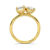 MOHSTEN JEWELLERS . CAIRO toi et moi diamond engagement ring - pear cut and emerald cut - yellow gold -  through finger  view