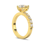 MOHSTEN JEWELLERS, MARBELLA off-set pear diamond solitaire engagement ring -  yellow gold -  side angle view