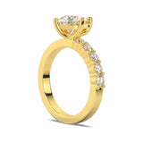 MOHSTEN JEWELLERS, MARBELLA off-set pear diamond solitaire engagement ring -  yellow gold -  side angle view