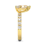 MOHSTEN JEWELLERS, MARBELLA off-set pear diamond solitaire engagement ring -  yellow gold -  side  view