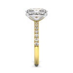 MOHSTEN JEWELLERS, Manilla elongated cushion cut diamond four claw solitaire with diamond band engagement ring , yellow gold,  side view