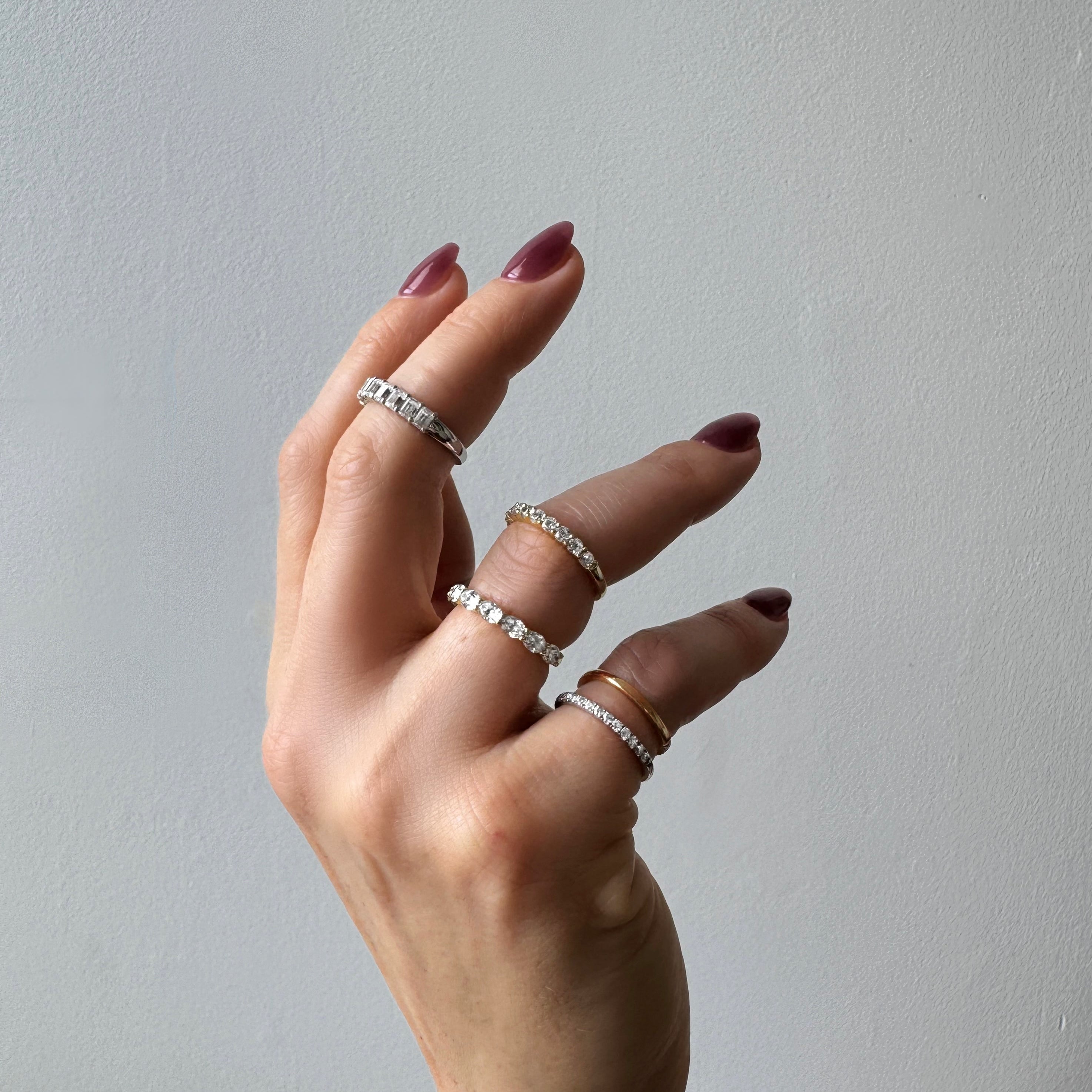 Diamond wedding rings on womens hand