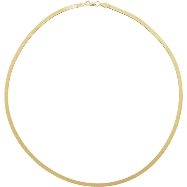 Mini herringbone necklace in 14ct gold, 2.8 mm wide and 40 cm long, shown on white background
