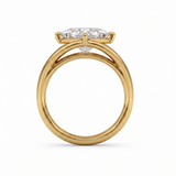 Gold ring with a diamond on a white background
