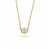 Gold necklace with a diamond pendant on a white background