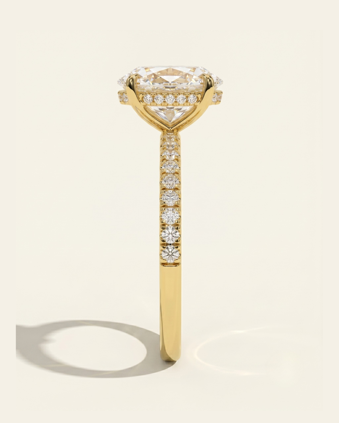 Front view of the MOHSTEN Aspen oval diamond engagement ring in 18ct yellow gold showcasing the elongated oval brilliant centre stone and clean four-claw basket setting.