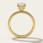 Side profile architecture view of the MOHSTEN Aspen oval diamond engagement ring in 18ct yellow gold highlighting the hidden halo design and accent diamond band.