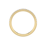 Gold ring with small diamonds on a white background