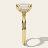 End profile view of the MOHSTEN Brooklyn engagement ring in 18ct yellow gold highlighting the architectural double-claw basket design and signature fluted band.