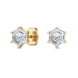 Close-up of hexagon diamond setting in polished yellow gold with butterfly back detail.

