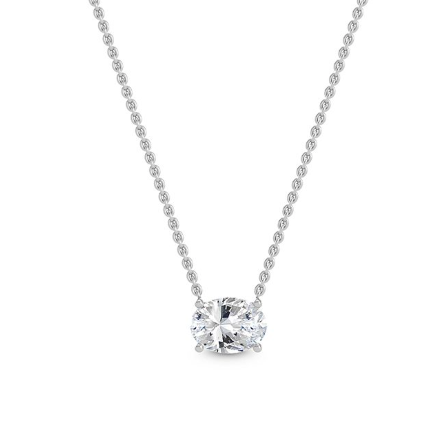 0.75 ct oval-cut diamond set east–west in three-claw pendant on fine 18 ct white gold chain, displayed on white background