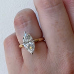 MOHSTEN Niseko marquise diamond solitaire engagement ring modelled on hand, displaying its elongated architectural silhouette and high-polish 1.8mm band.