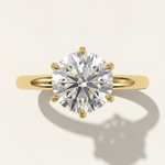 MOHSTEN Jaipur round diamond solitaire engagement ring in 18ct yellow gold showcasing a face-on portrait view of the premium round brilliant centre stone and signature 6-prong setting.