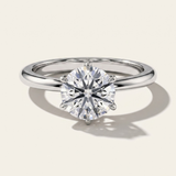 MOHSTEN Jaipur round diamond solitaire engagement ring in polished platinum showcasing a face-on portrait view of the premium round brilliant centre stone and signature 6-prong setting.
