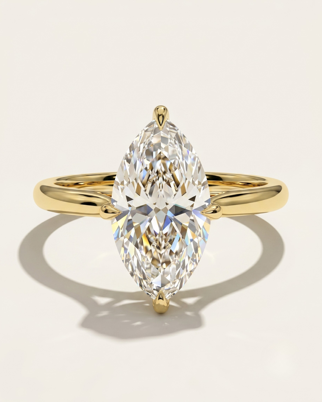MOHSTEN Niseko marquise diamond engagement ring in 18ct yellow gold featuring a solitaire marquise cut centre stone with protective prongs