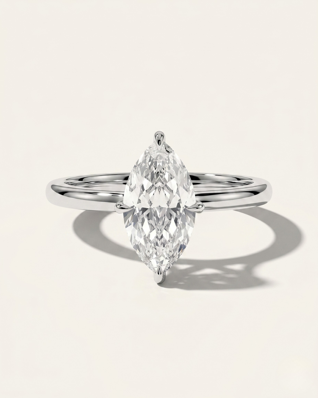 MOHSTEN Niseko marquise diamond engagement ring in 18ct yellow gold featuring a solitaire marquise cut centre stone with protective prongs in white gold
