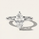 MOHSTEN Niseko marquise diamond engagement ring in 18ct yellow gold featuring a solitaire marquise cut centre stone with protective prongs in white gold