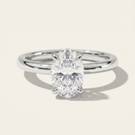 MOHSTEN Osaka oval diamond solitaire engagement ring in polished platinum showcasing a premium oval brilliant centre diamond in a minimalist signature 4-prong basket setting.