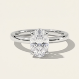 MOHSTEN Osaka oval diamond solitaire engagement ring in polished platinum showcasing a premium oval brilliant centre diamond in a minimalist signature 4-prong basket setting.