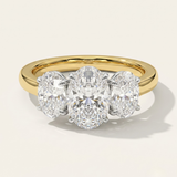 MOHSTEN Sydney oval diamond trilogy engagement ring in 18ct yellow gold showcasing a premium central oval diamond flanked symmetrically by two matching oval side stones.
