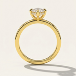 Side profile view of the MOHSTEN Niseko engagement ring highlighting the signature minimalist 4-prong basket and brilliant hidden diamond halo.