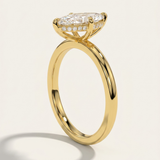 Side angle view of the MOHSTEN Niseko engagement ring highlighting the signature minimalist 4-prong basket and brilliant hidden diamond halo.