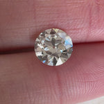 Video of a 1.52ct Old European cut lab diamond sparkling between fingers. Sourced for MOHSTEN custom rings in Auckland.