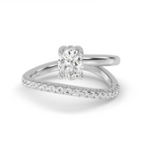 white gold Sargasso wrap ring featuring a 0.70 carat oval lab-grown diamond and an asymmetrical, sweeping diamond-set band.