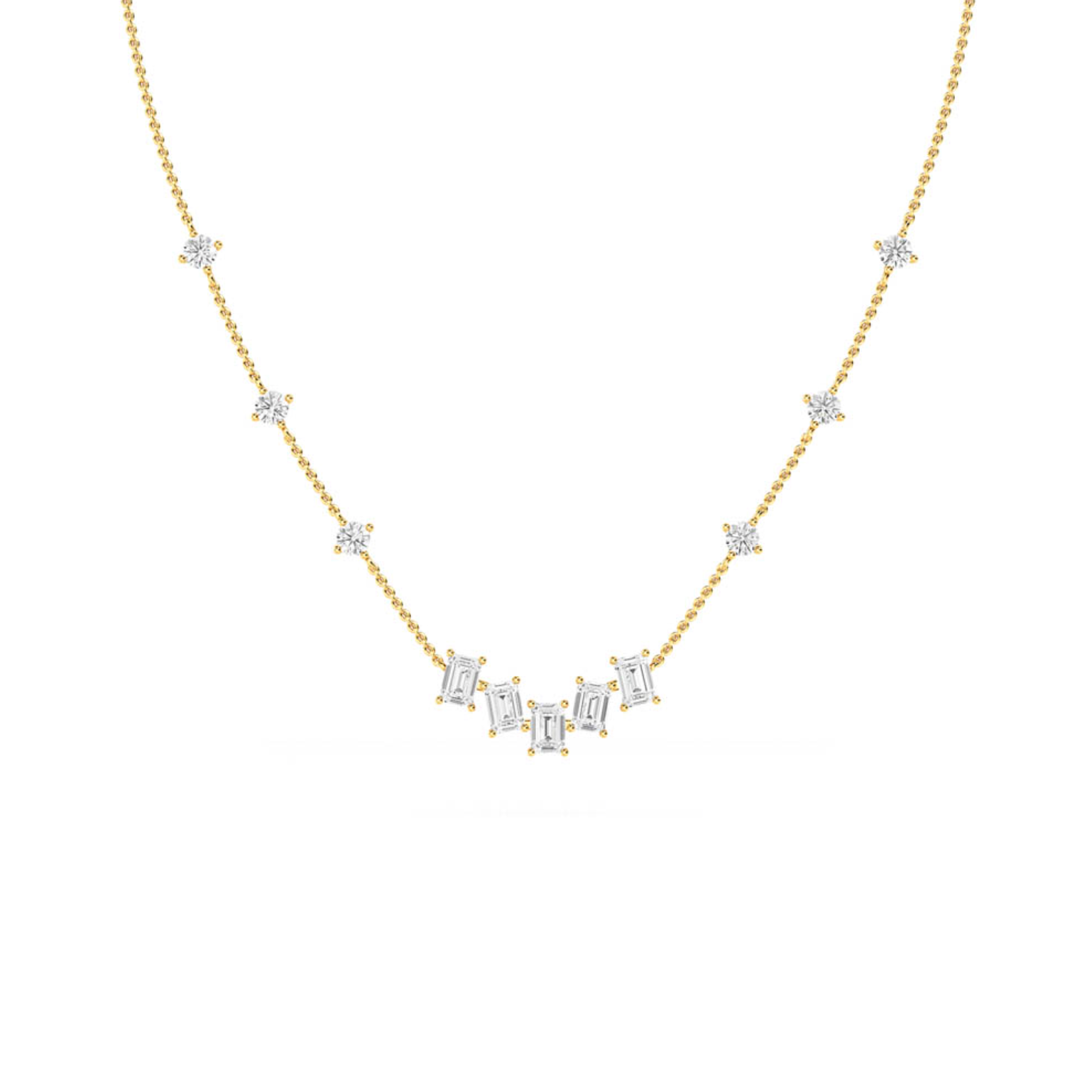 A gold necklace featuring a series of round and emerald cut diamonds.